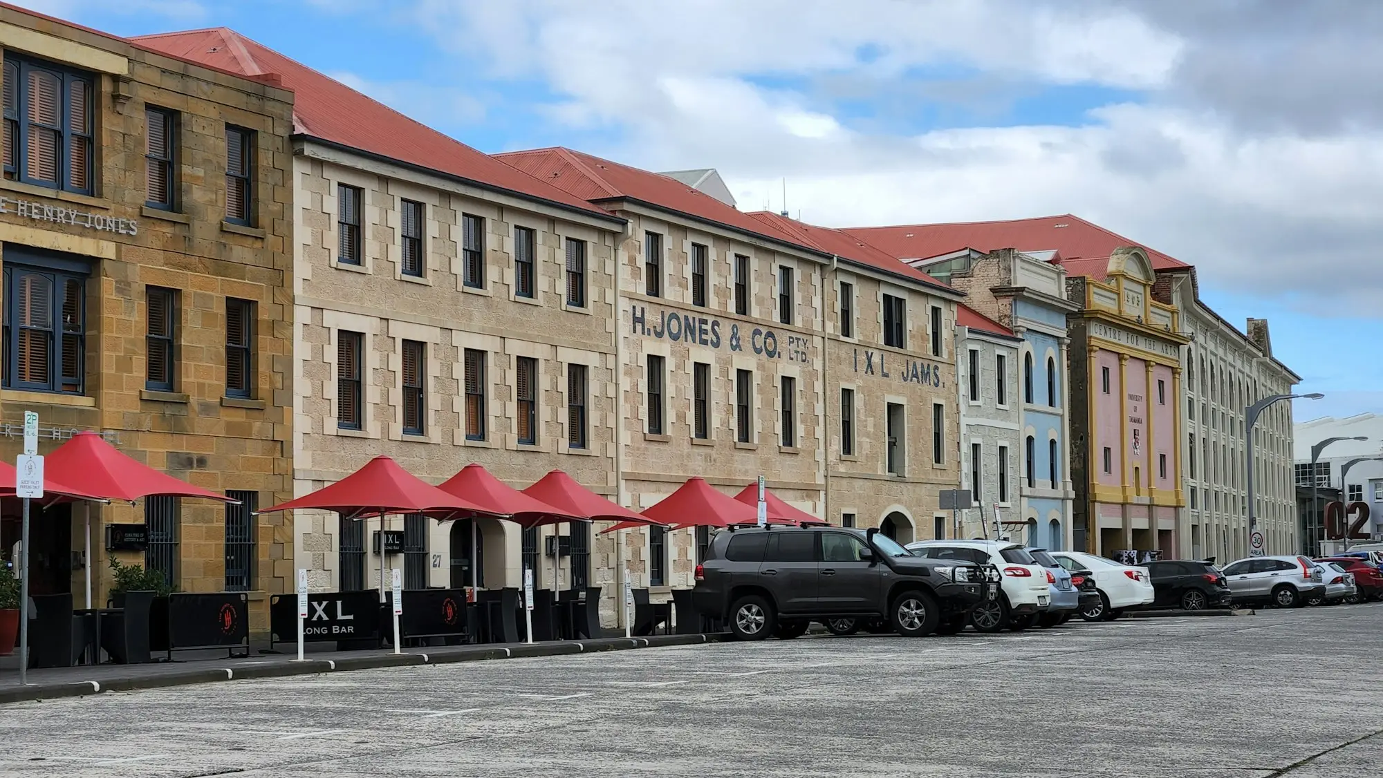 Heritage sandstone commercial buildings on a Hobart street
